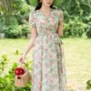 Váy Maxi Họa Tiết Hoa Thắt Nơ Eo Thanh Lịch